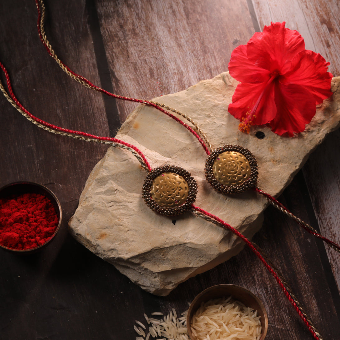 BRASS BLOSSOM RAKHI - Set of 2
