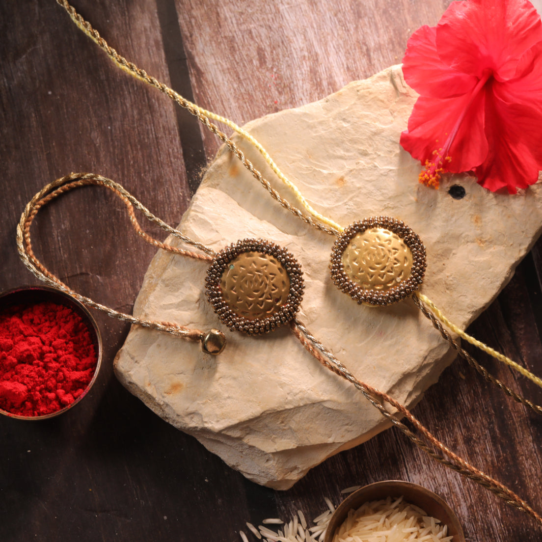 BRASS BLOSSOM RAKHI - Set of 2