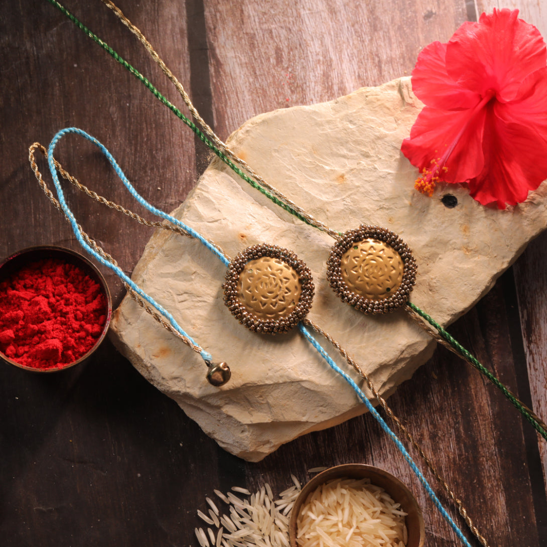 BRASS BLOSSOM RAKHI - Set of 2