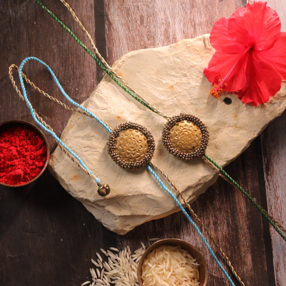 BRASS BLOSSOM RAKHI - Set of 2