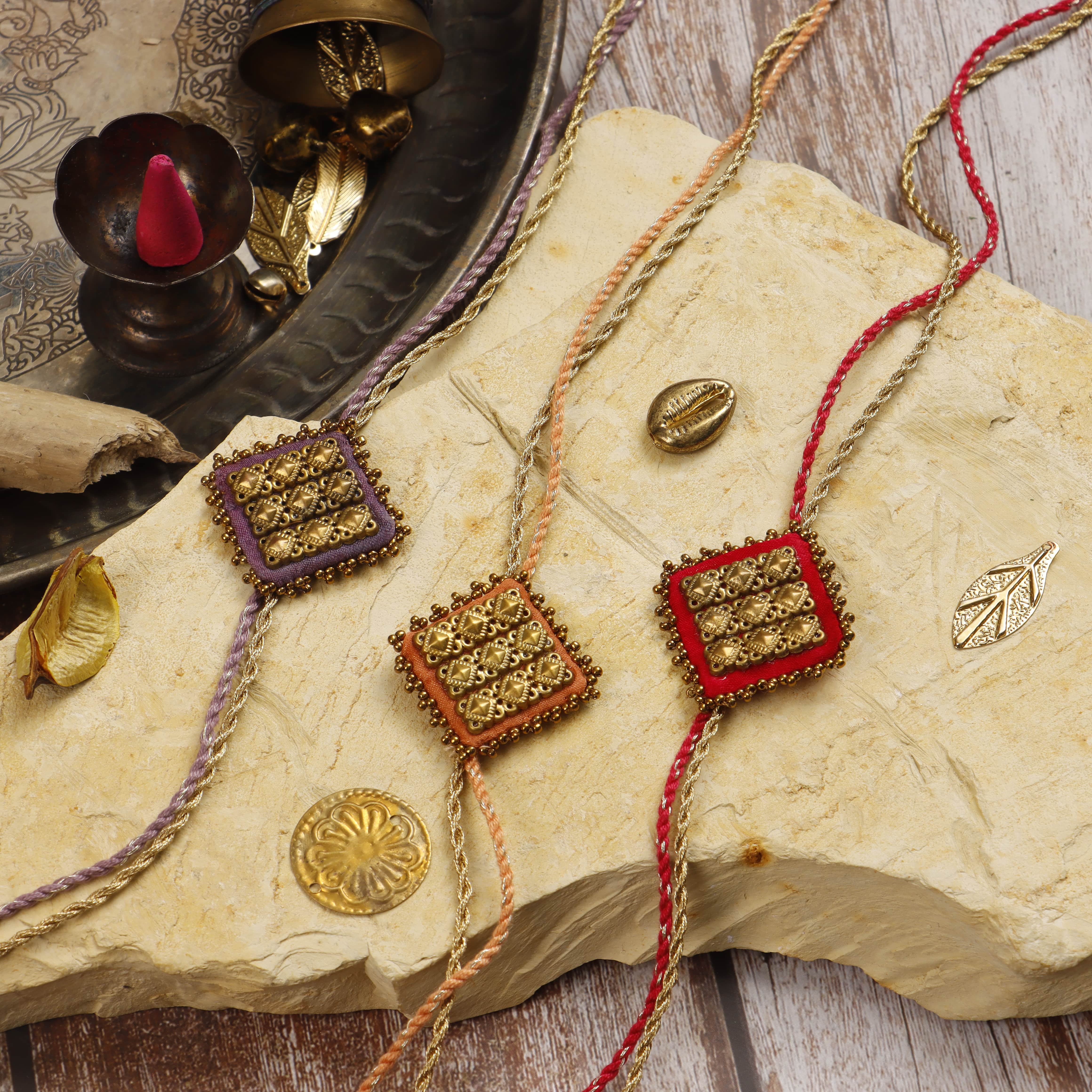 MAJESTIC SQAURE BRASS RAKHI - Set of 3