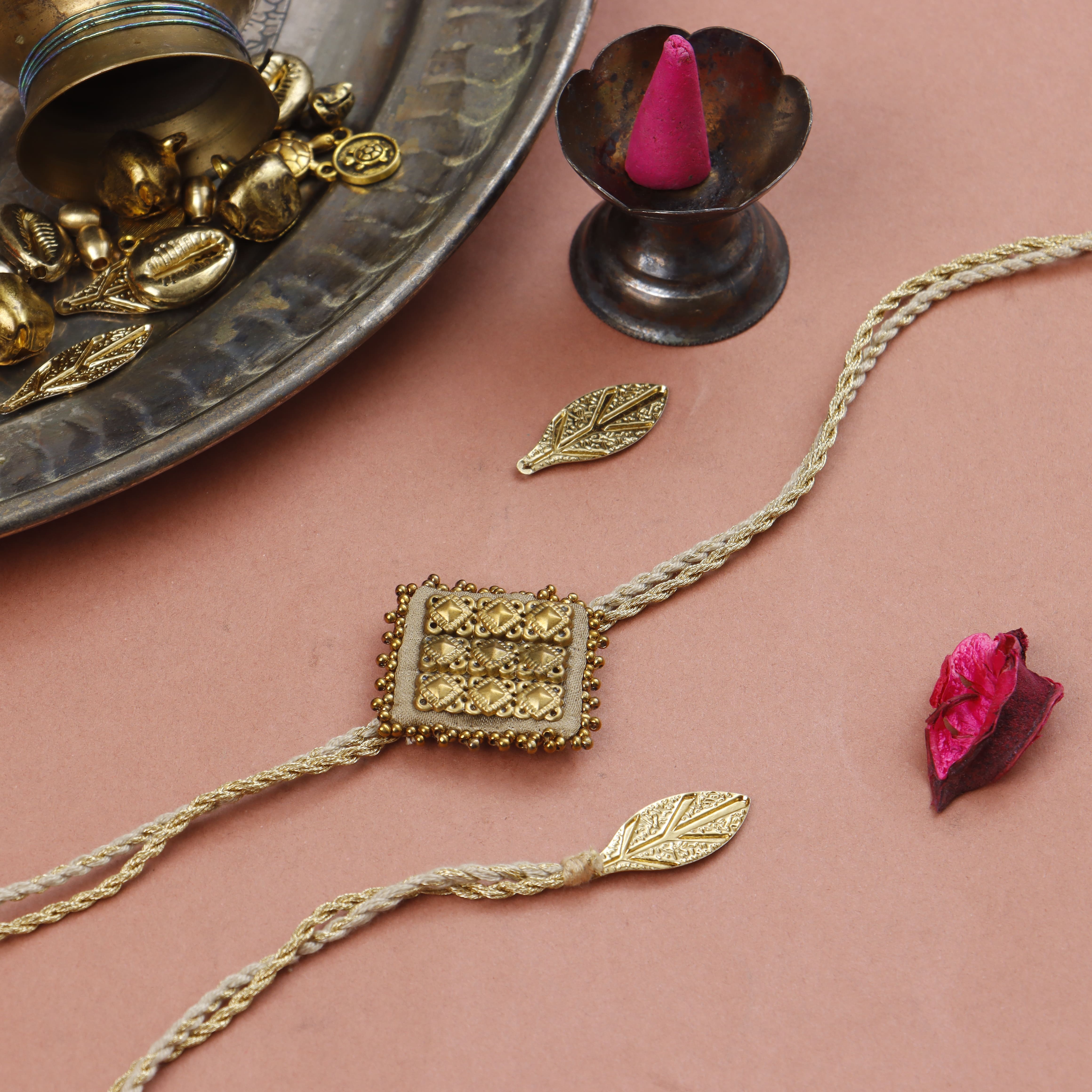 MAJESTIC SQAURE BRASS RAKHI - Set of 4