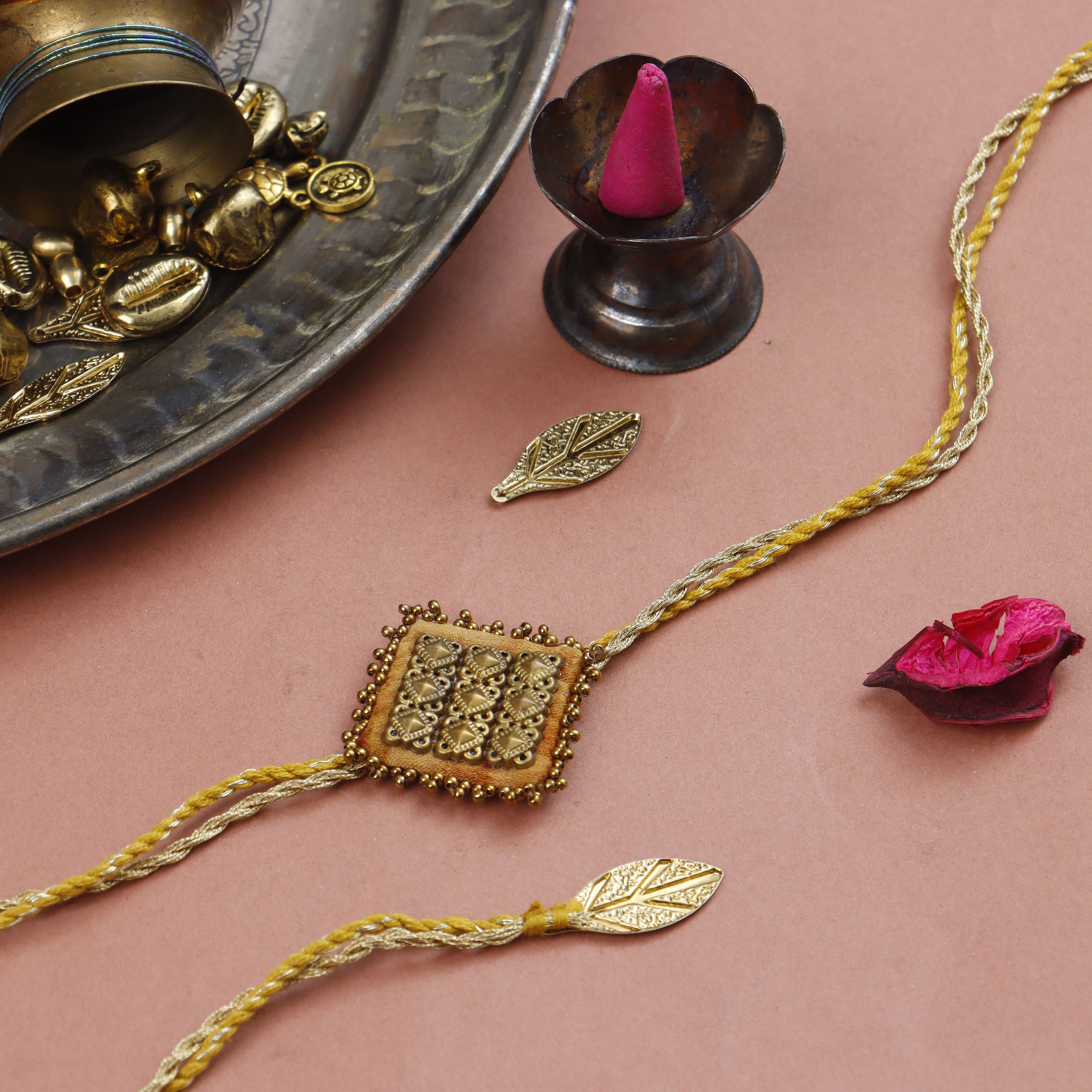 MEDALLION - MAJESTIC SQAURE BRASS RAKHI