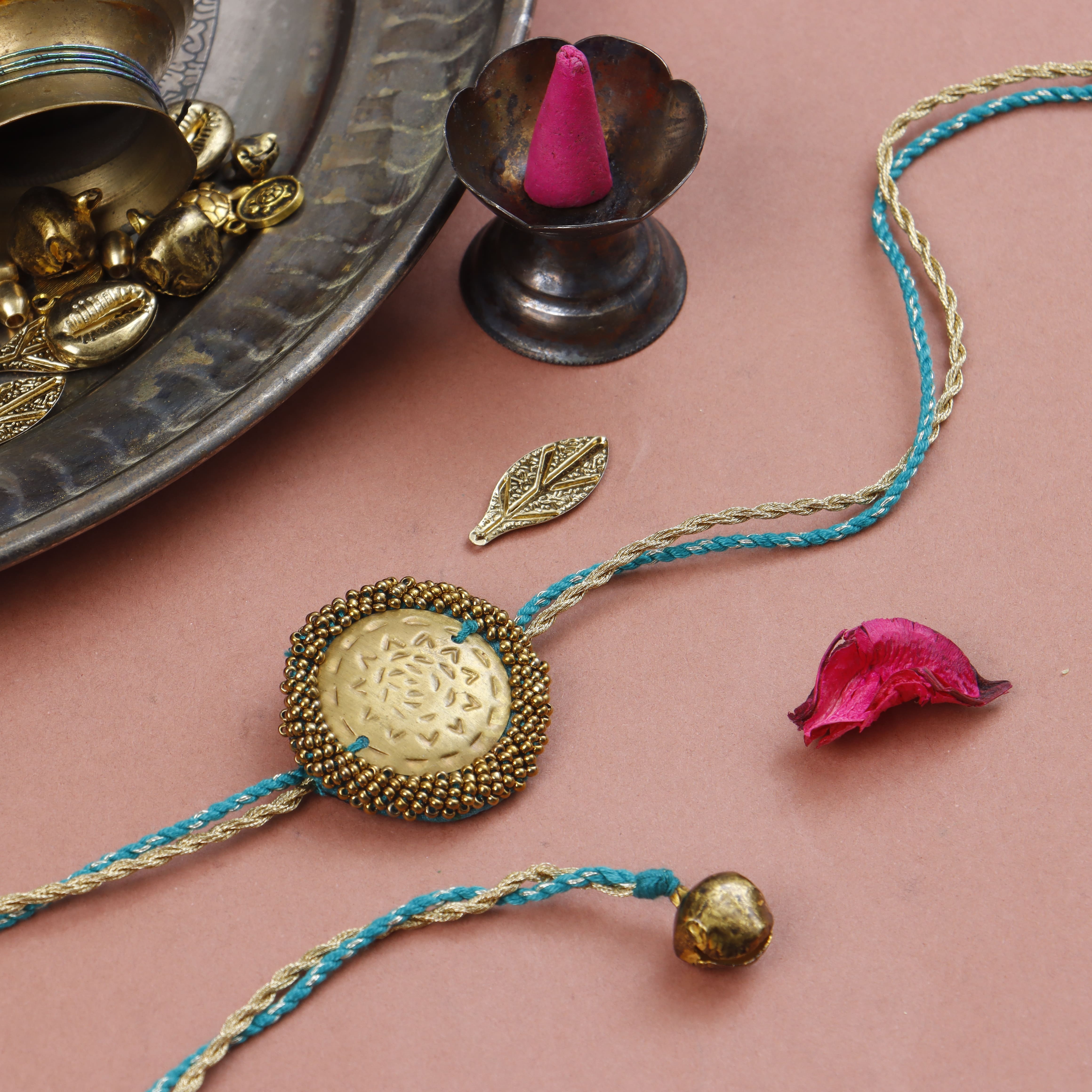 BRASS BLOSSOM RAKHI - Set of 3
