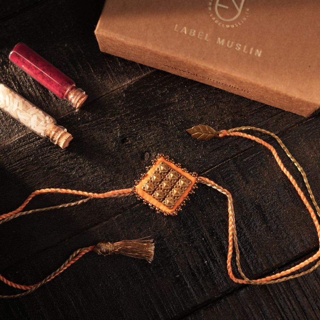 ORANGE - MAJESTIC SQAURE BRASS RAKHI