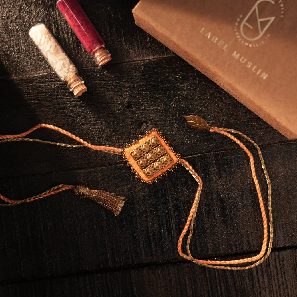 ORANGE - MAJESTIC SQAURE BRASS RAKHI