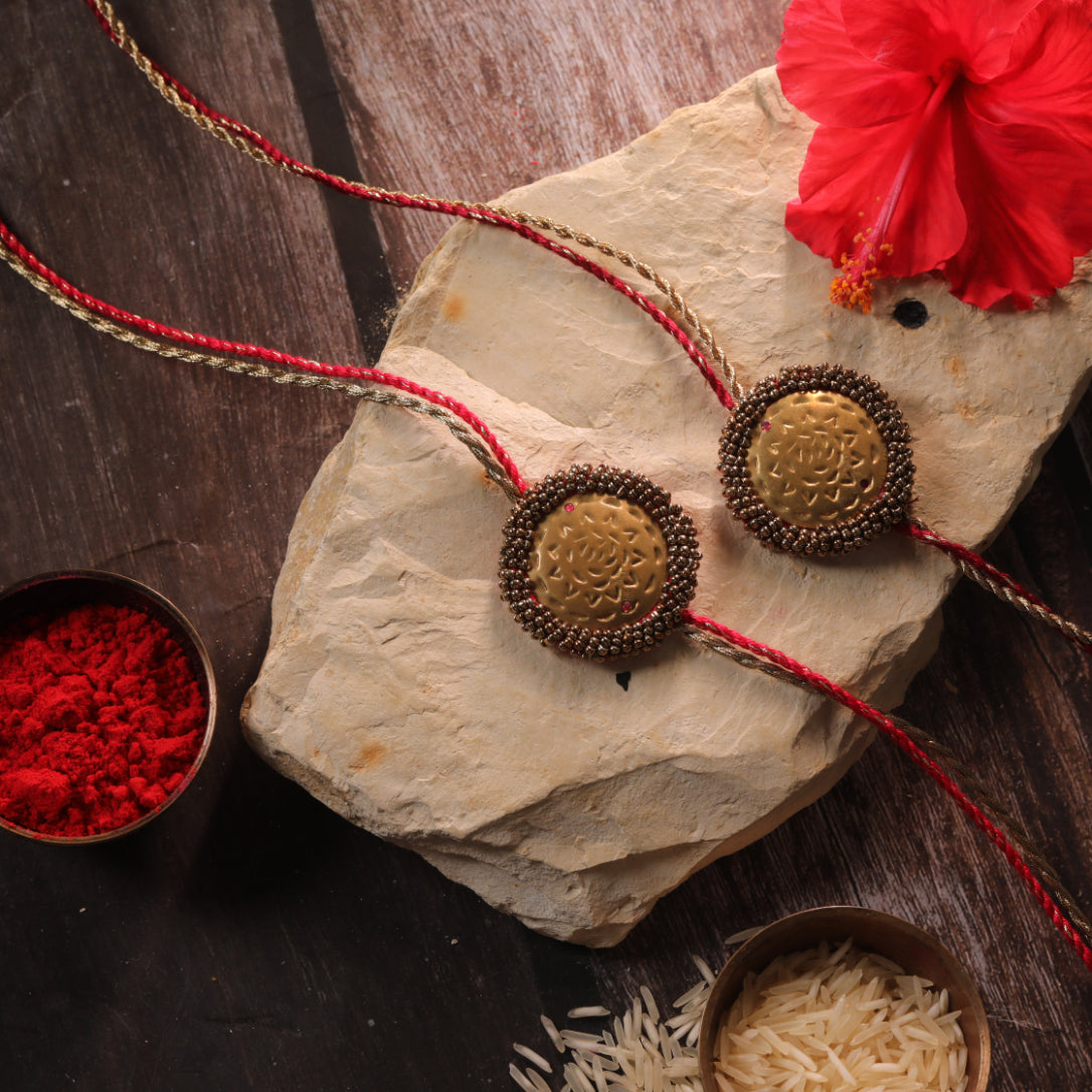 BRASS BLOSSOM RAKHI - Set of 2