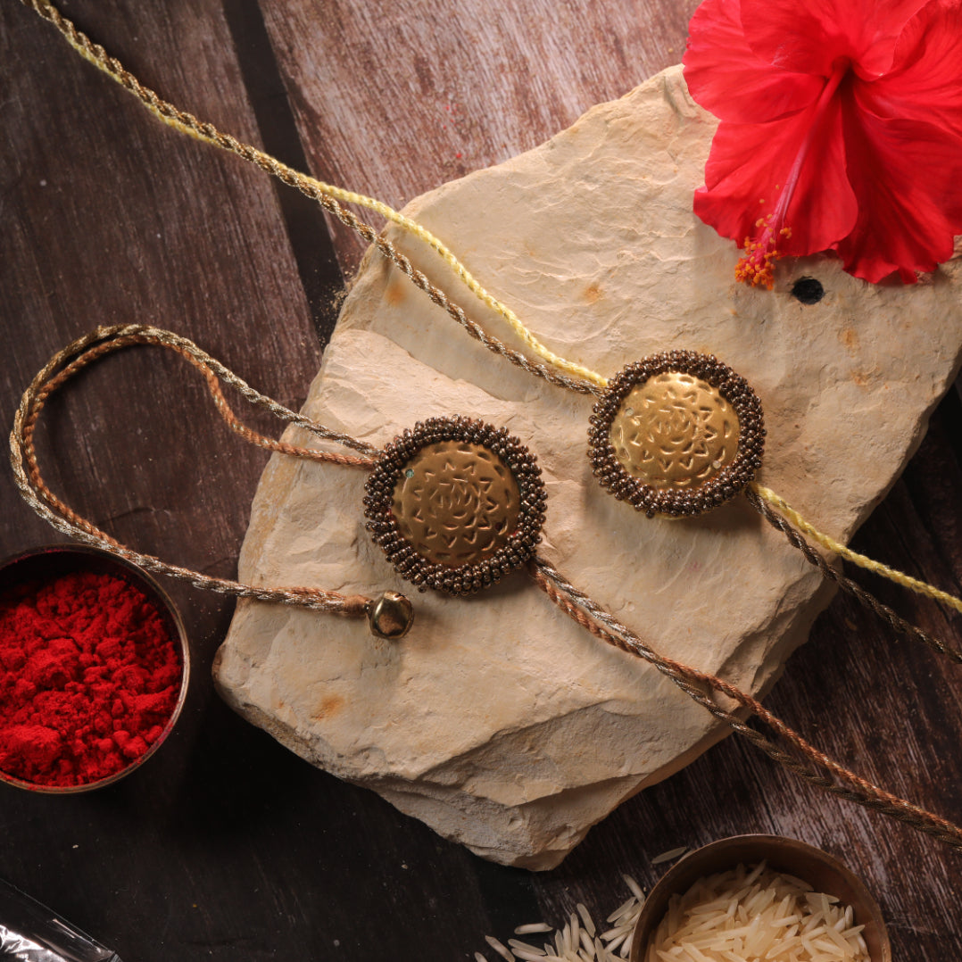 BRASS BLOSSOM RAKHI - Set of 2