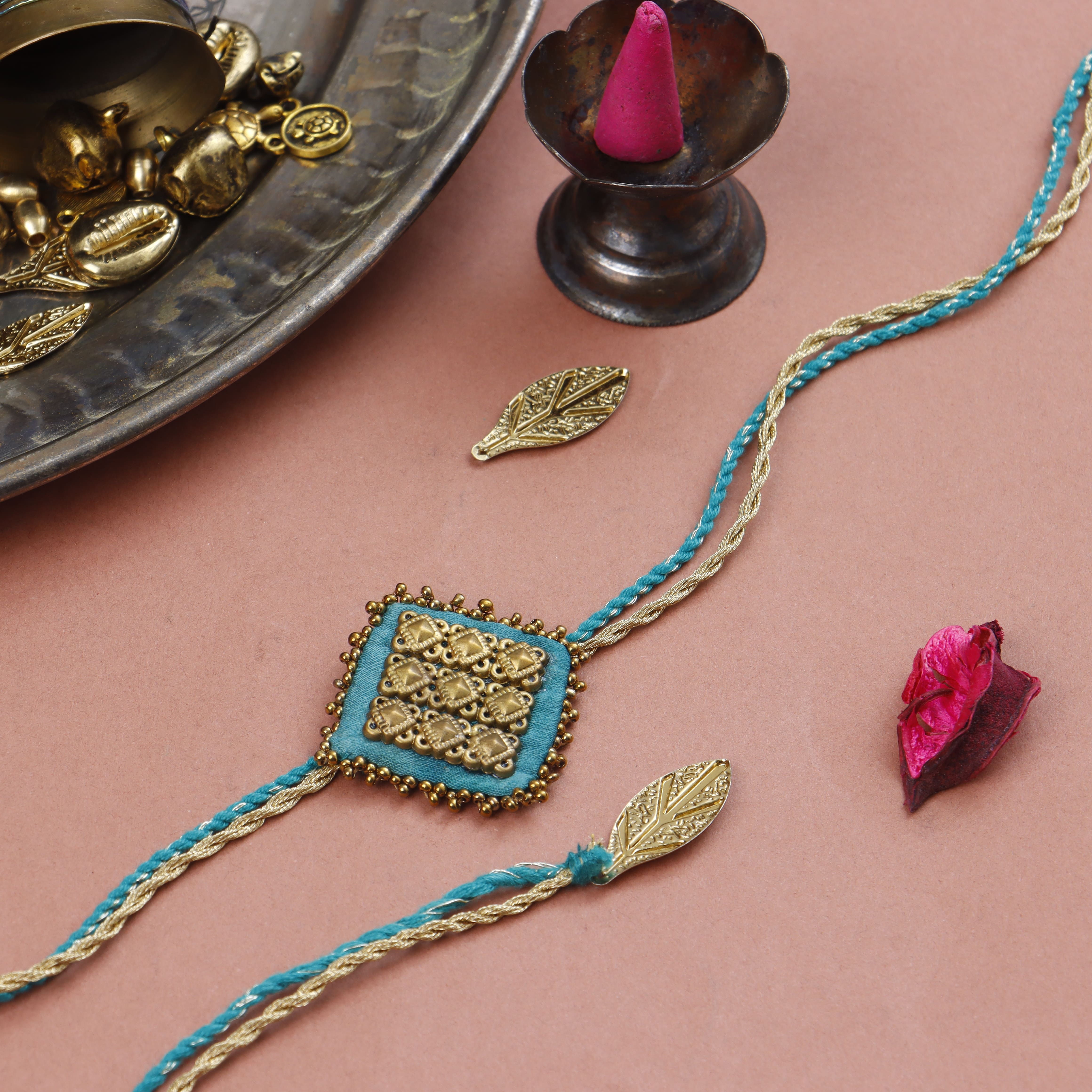 MAJESTIC SQAURE BRASS RAKHI - Set of 4