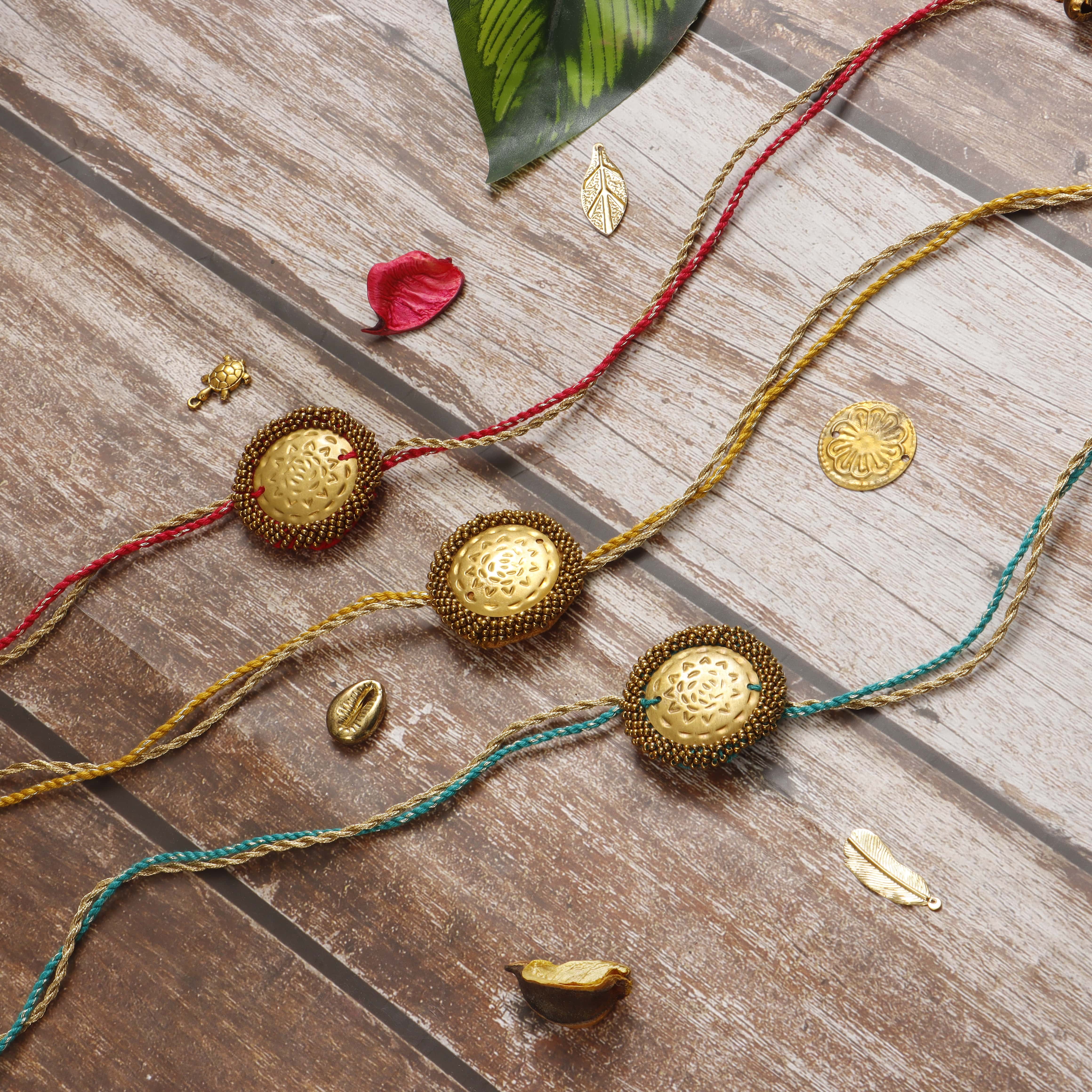 BRASS BLOSSOM RAKHI - Set of 3