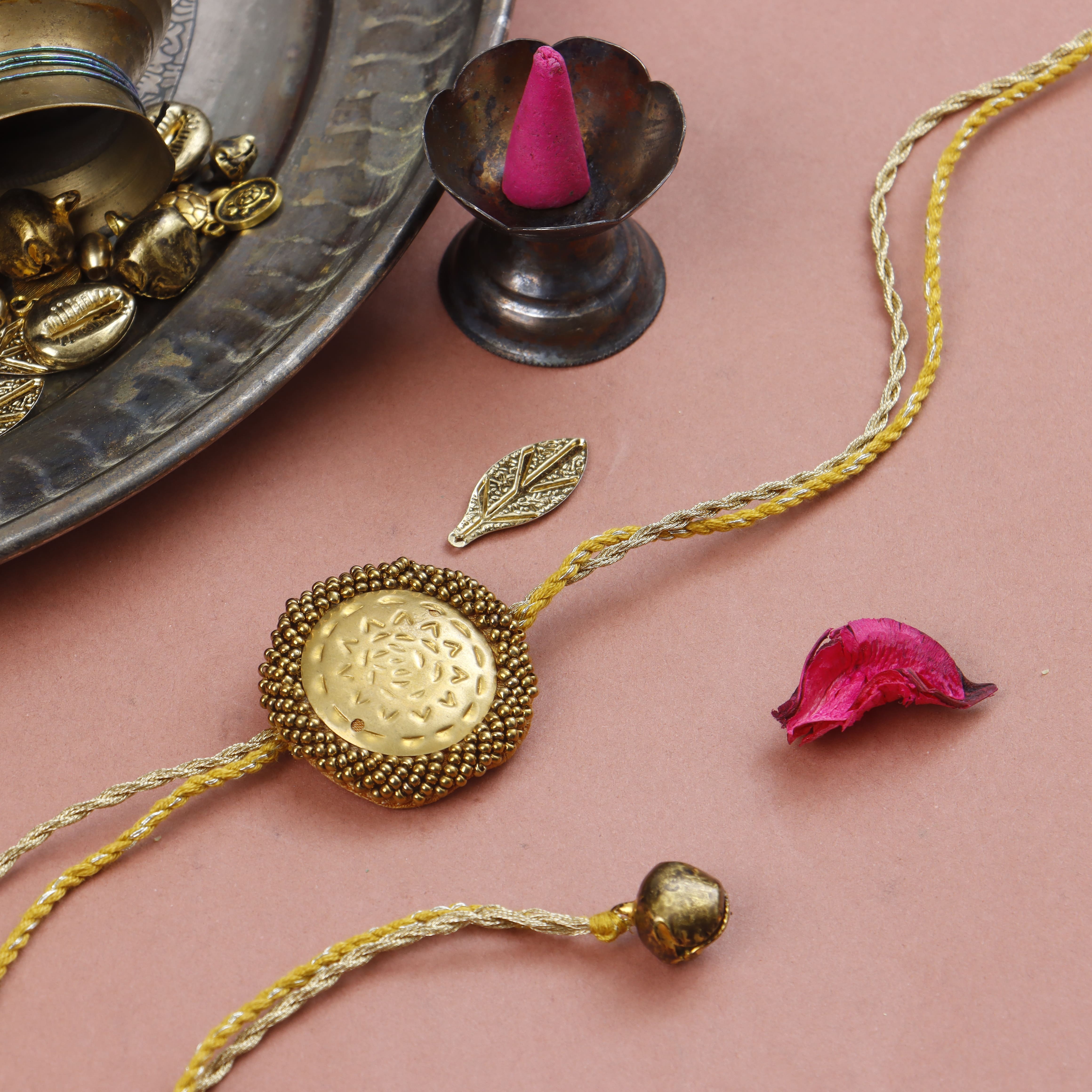 BRASS BLOSSOM RAKHI - Set of 3