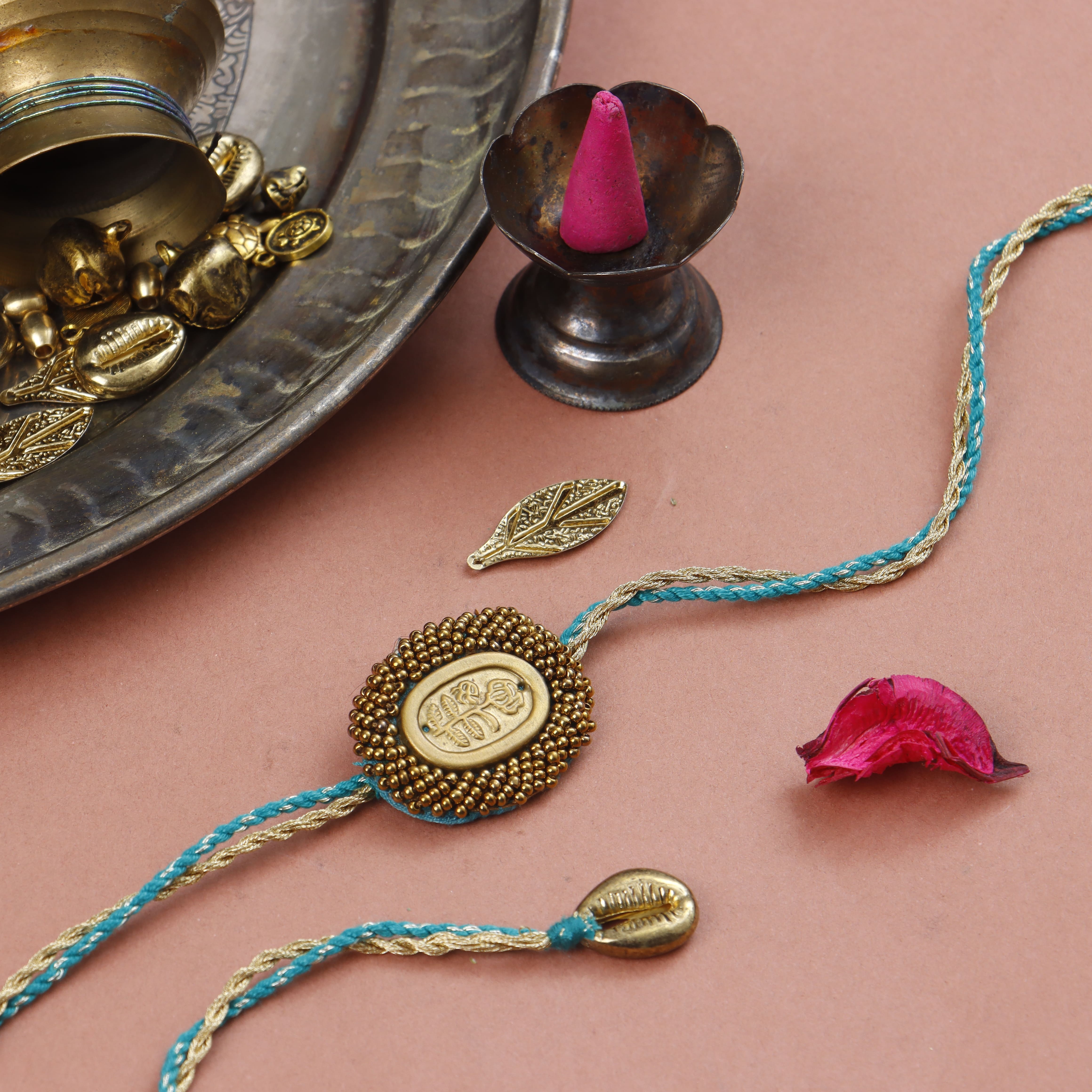 BRASS BLOSSOM RAKHI - Set of 3