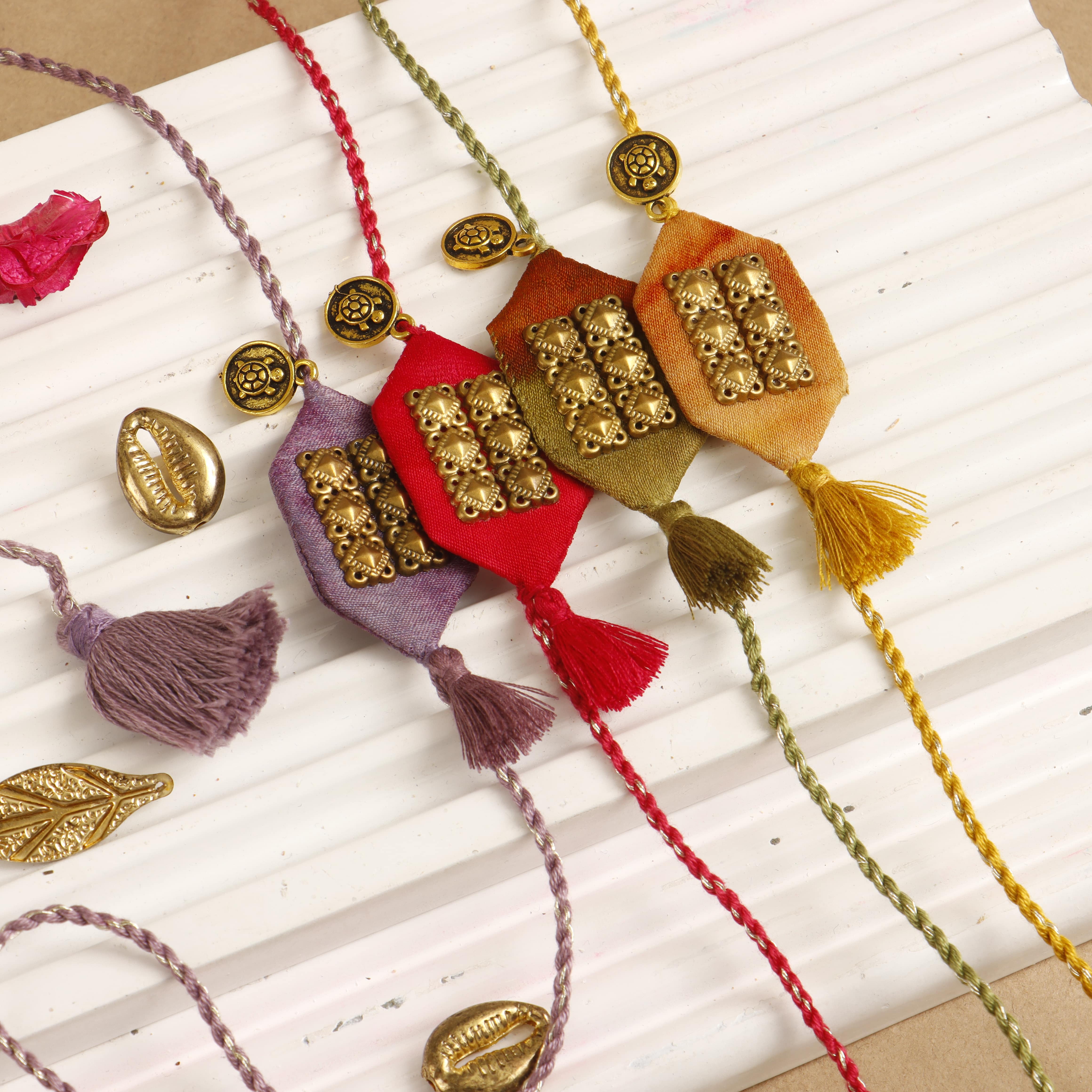 FUCHSIA - TURTLE TASSLE BLESSING RAKHI