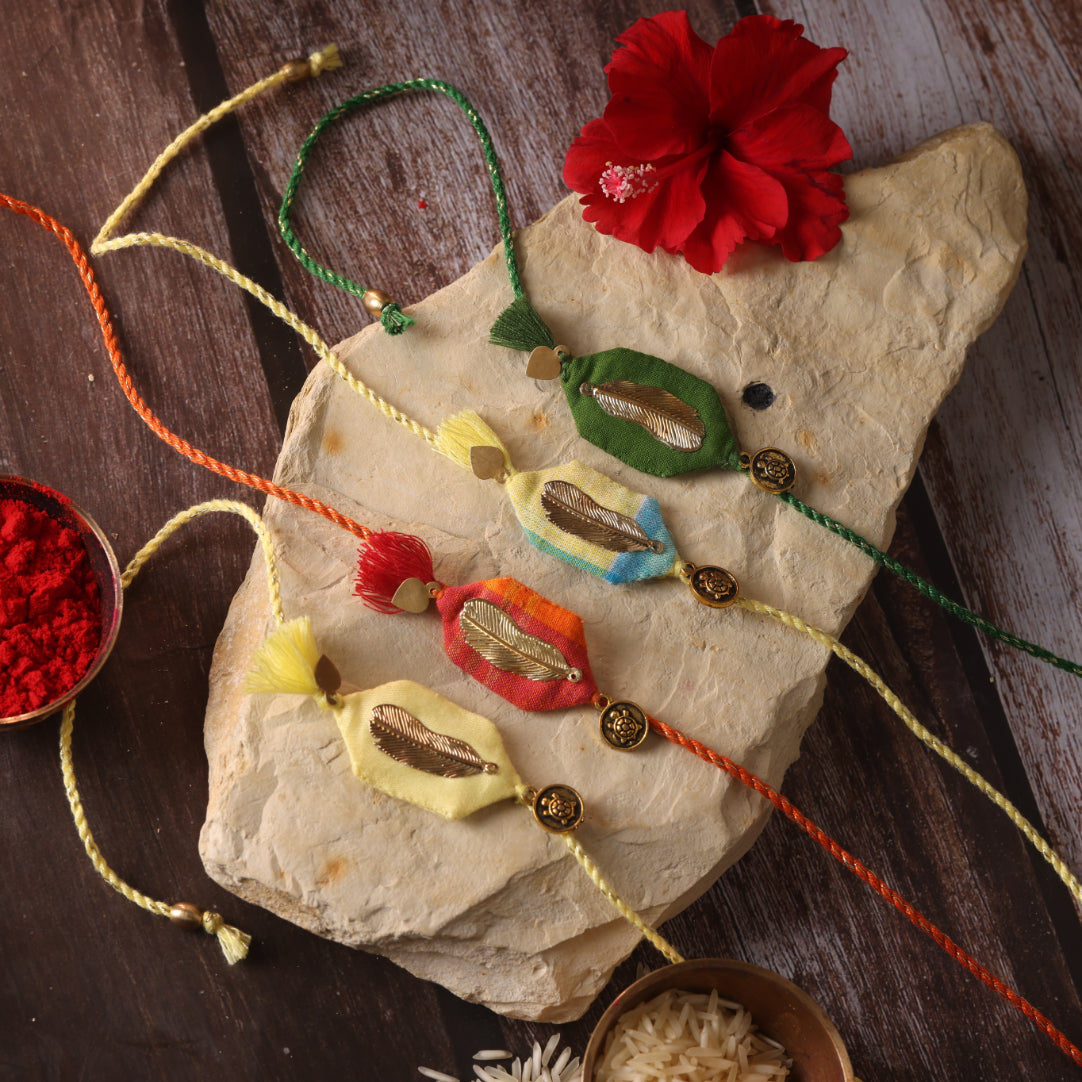 SUNHERI PANKH RAKHI - Set of 4