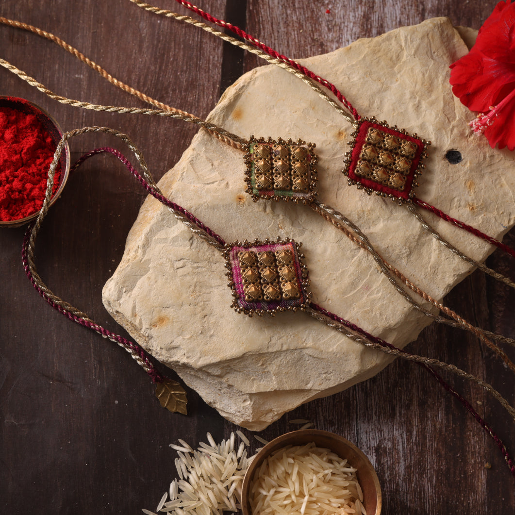MAJESTIC SQAURE BRASS RAKHI - Set of 3