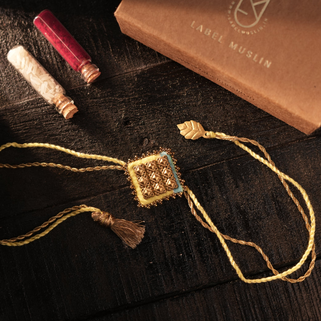 YELLOW - MAJESTIC SQAURE BRASS RAKHI