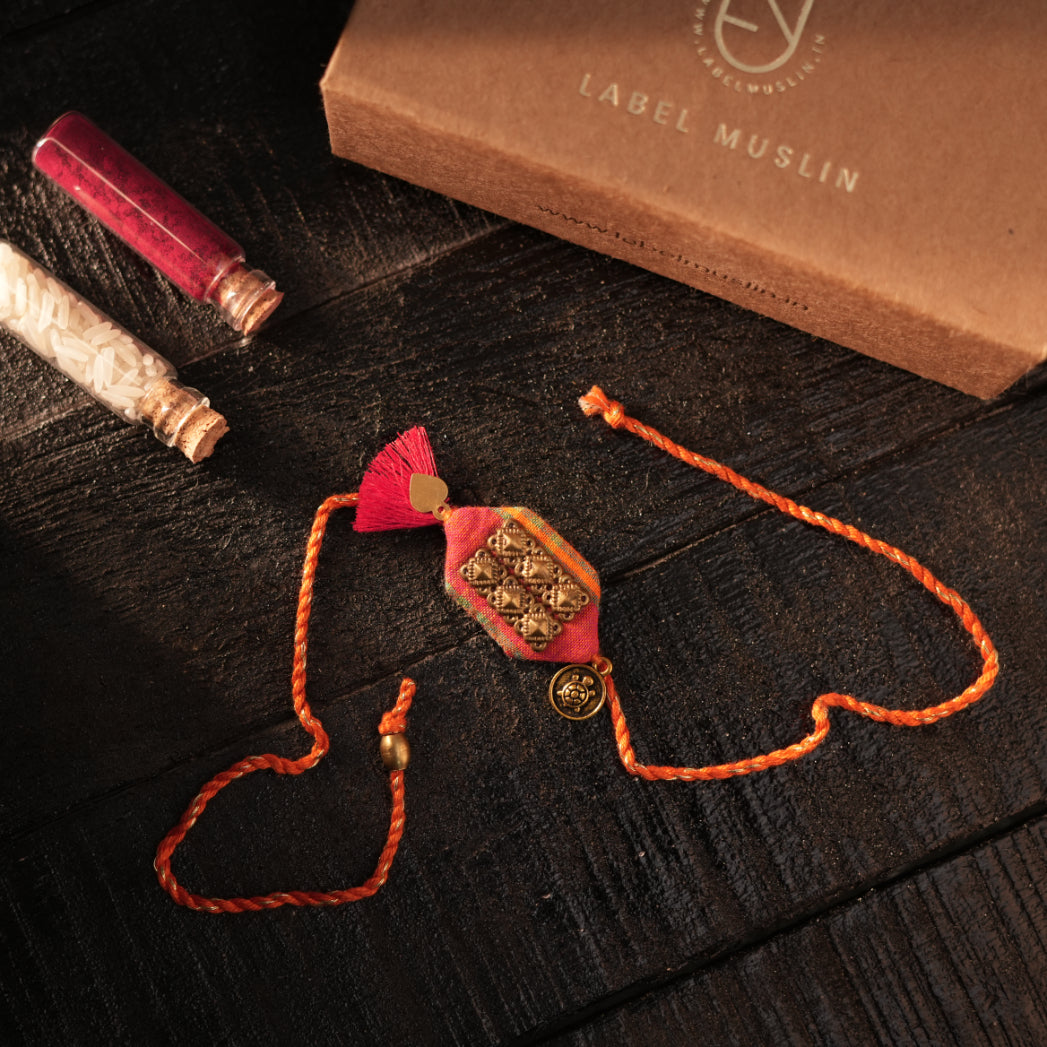 CORAL - TURTLE TASSLE BLESSING RAKHI